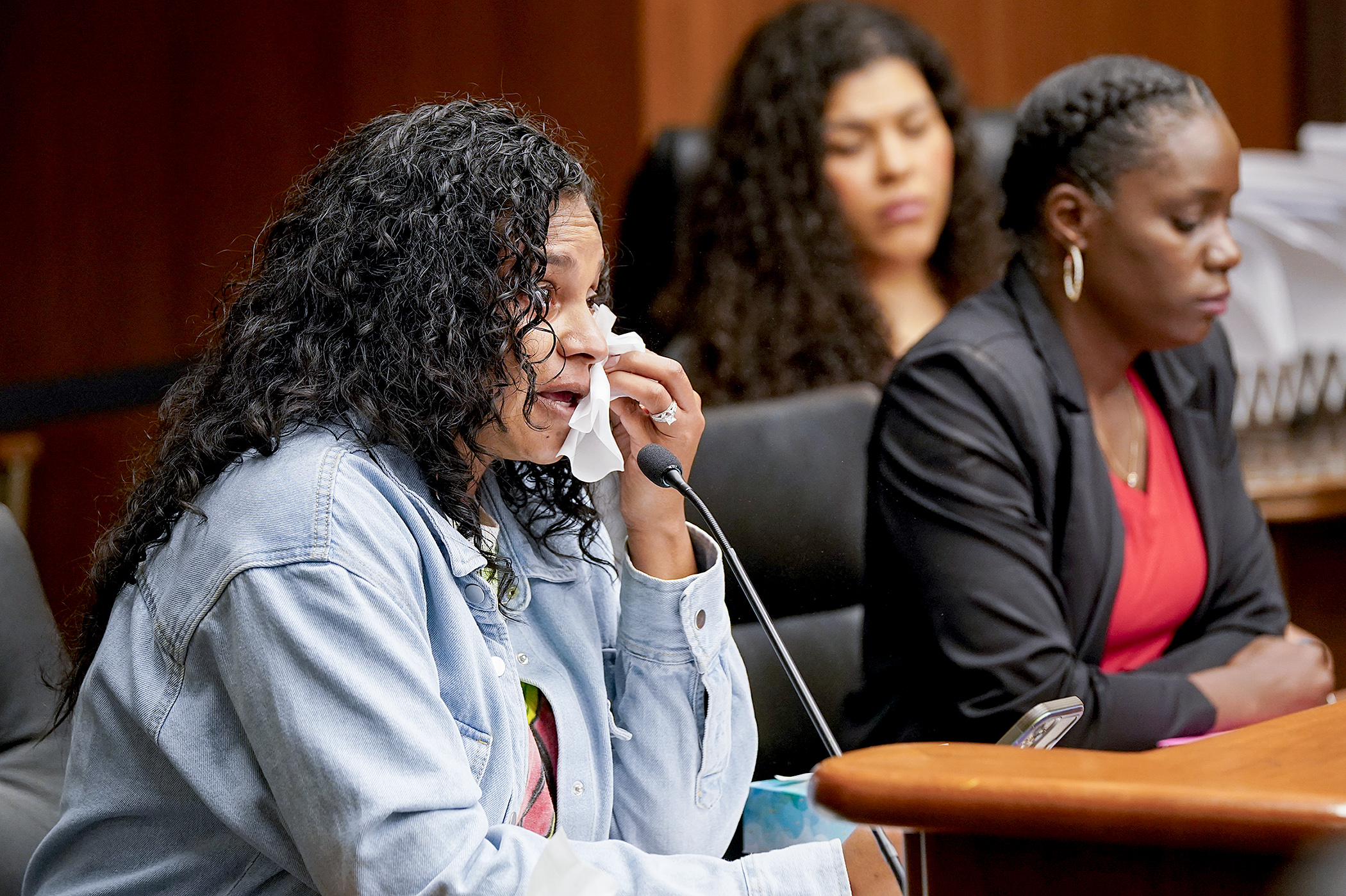 Mercedes Yarbrough shares with the House Children and Families Finance and Policy Committee her experience with the CollegeBound Boost guaranteed income program. She supports HF2666, sponsored by Rep. Athena Hollins. (Photo by Michele Jokinen)
